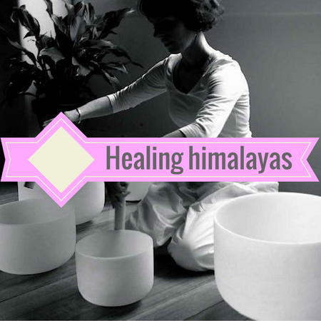 Image of Crystal Singing Bowl Chakra Sets. Seven frosted white crystal singing bowl - one each for each of the seven chakras. Singing bowls tuned to chakras.